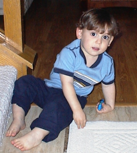 Christopher posing next to the stairs (February 2005)
