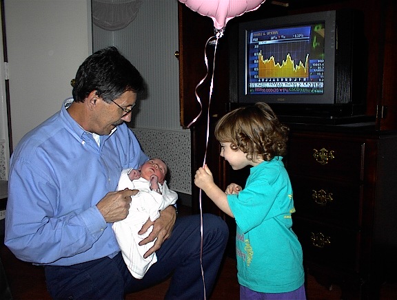 Grandpa Dale and Samantha welcoming Jessica into the new world (2000)